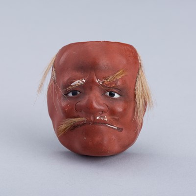 A LACQUERED PAPER MACHÉ MASK NETSUKE OF AN OLD MAN, MEIJI