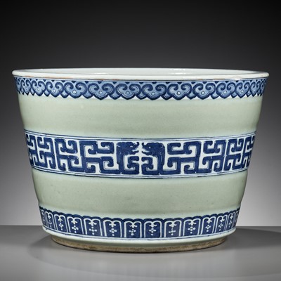 Lot 241 - A BLUE AND WHITE DECORATED CELADON-GROUND JARDINIERE, QING DYNASTY