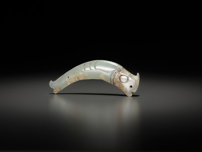 Lot 1016 - A PALE CELADON ‘FISH’ PENDANT, LATE SHANG TO EARLY WESTERN ZHOU DYNASTY