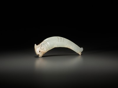 Lot 52 - A PALE CELADON ‘FISH’ PENDANT, LATE SHANG TO EARLY WESTERN ZHOU DYNASTY