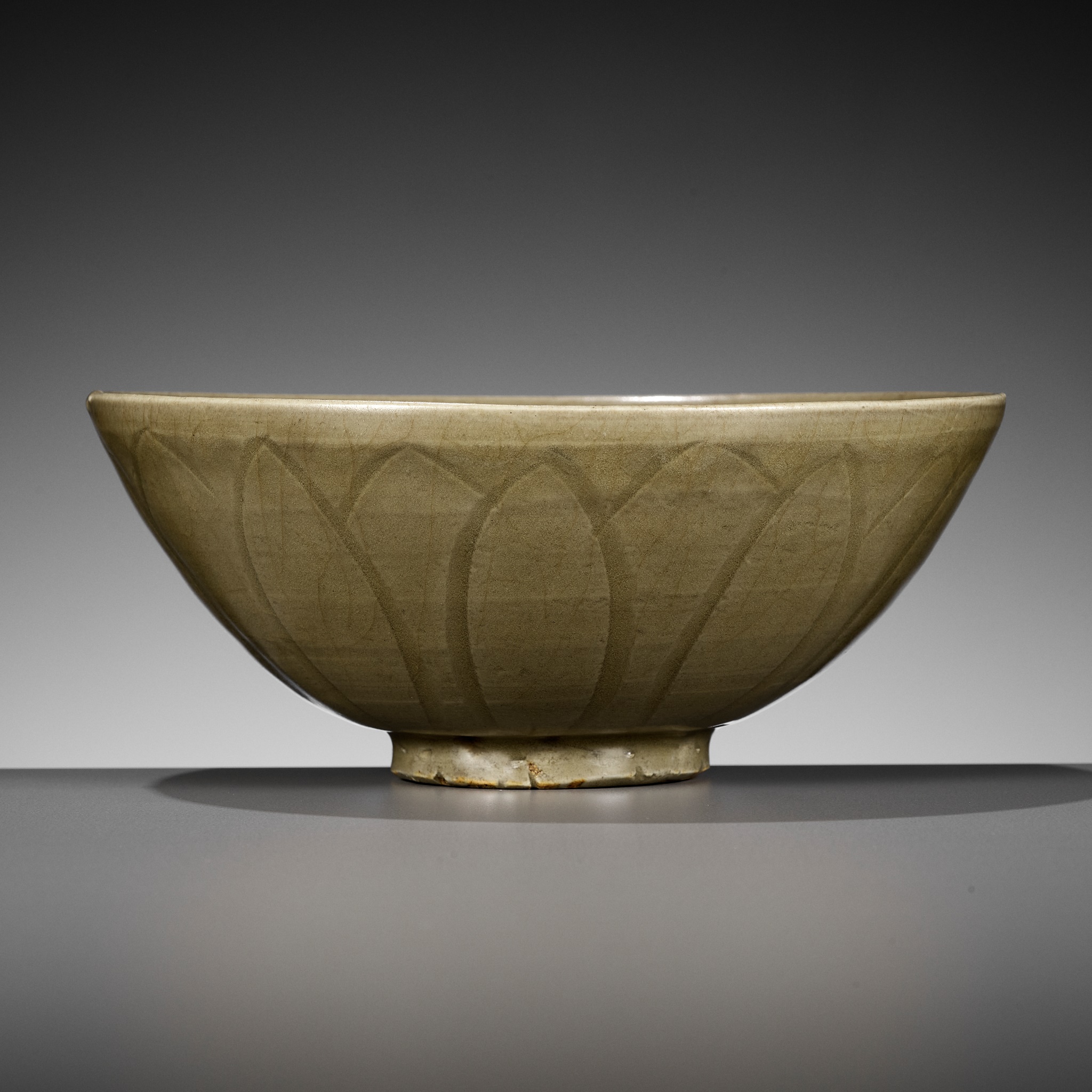 Lot 161 - A LONGQUAN CELADON CARVED 'LOTUS PETAL' BOWL,