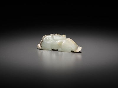 Lot 49 - A JADE ‘RABBIT’ PENDANT, LATE SHANG TO EARLY WESTERN ZHOU DYNASTY