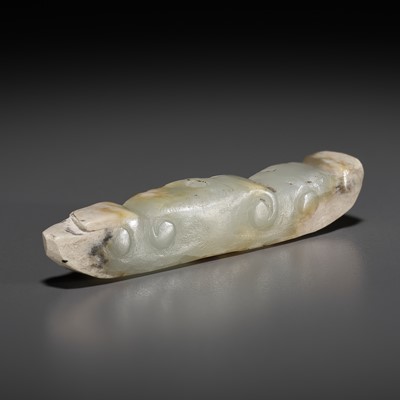 Lot 1015 - A JADE ‘SILKWORM’ PENDANT, LATE NEOLITHIC PERIOD TO SHANG DYNASTY