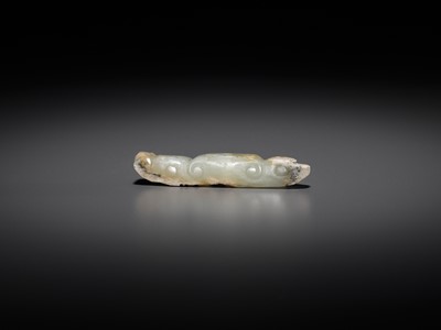 Lot 43 - A JADE ‘SILKWORM’ PENDANT, LATE NEOLITHIC PERIOD TO SHANG DYNASTY