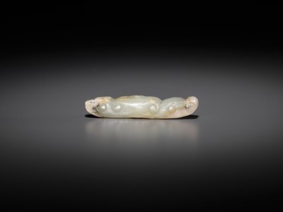 Lot 43 - A JADE ‘SILKWORM’ PENDANT, LATE NEOLITHIC PERIOD TO SHANG DYNASTY