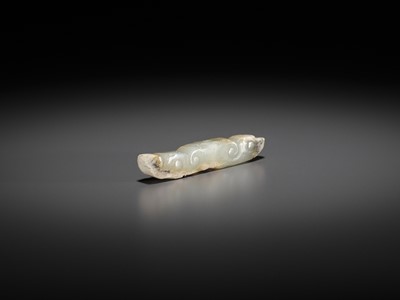 Lot 1015 - A JADE ‘SILKWORM’ PENDANT, LATE NEOLITHIC PERIOD TO SHANG DYNASTY