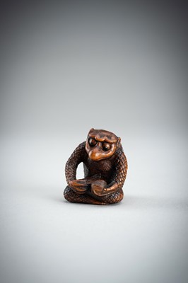 Lot 418 - MASAAKI: AN AMUSING BOXWOOD SHUNGA NETSUKE OF A KAPPA, MEIJI