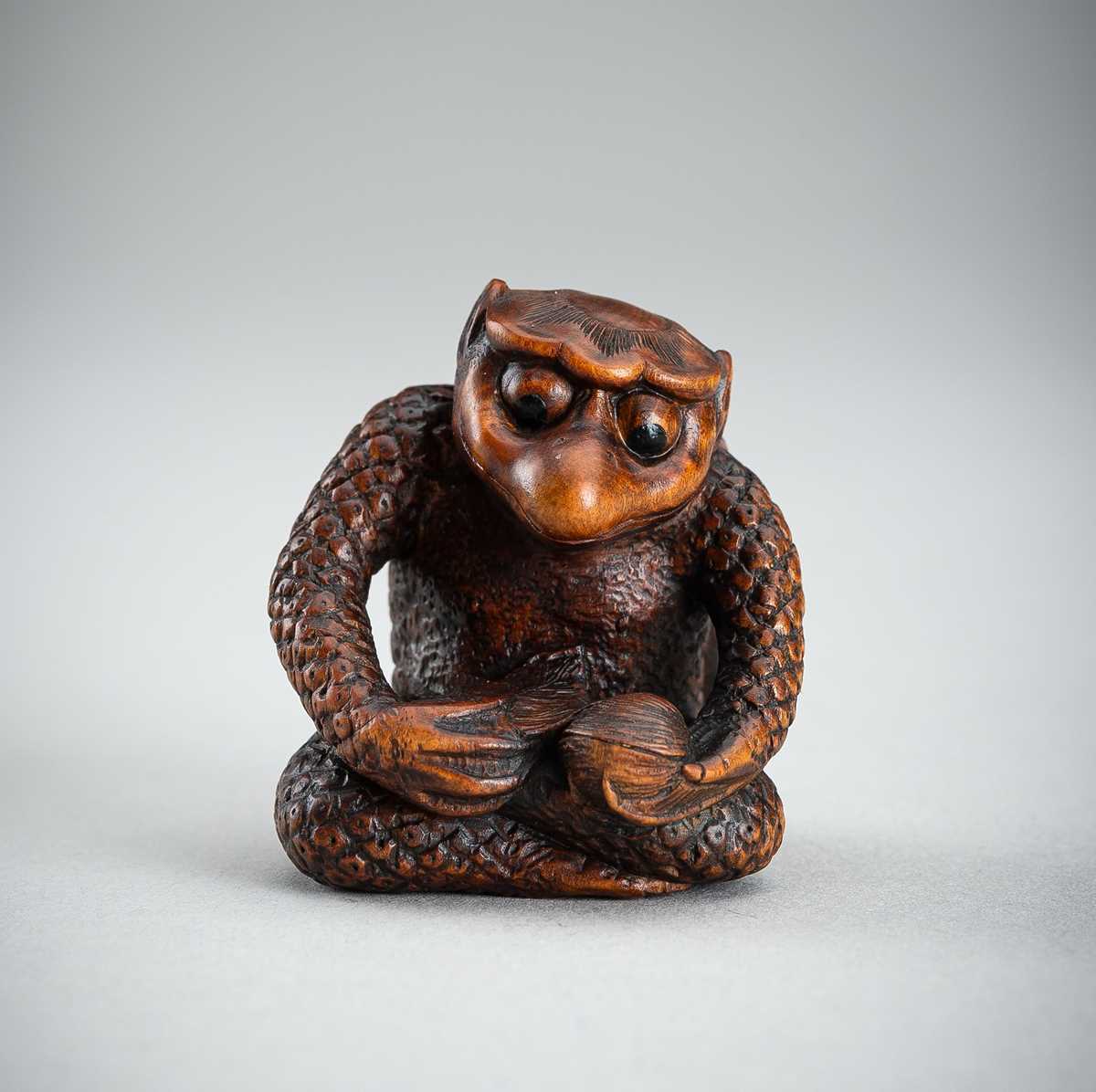 Lot 418 - MASAAKI: AN AMUSING BOXWOOD SHUNGA NETSUKE OF A KAPPA, MEIJI