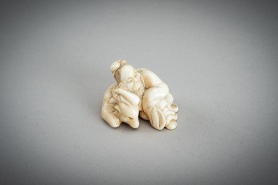 Lot 876 - AN IVORY NETSUKE OF A SAGE RECLINING ON A GOAT, EDO PERIOD