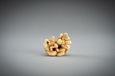 Lot 876 - AN IVORY NETSUKE OF A SAGE RECLINING ON A GOAT, EDO PERIOD