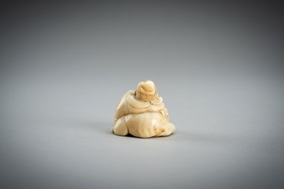 Lot 876 - AN IVORY NETSUKE OF A SAGE RECLINING ON A GOAT, EDO PERIOD