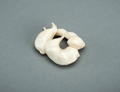 Lot 878 - AN IVORY NETSUKE OF THREE EDAMAME BEAN PODS, 19th CENTURY