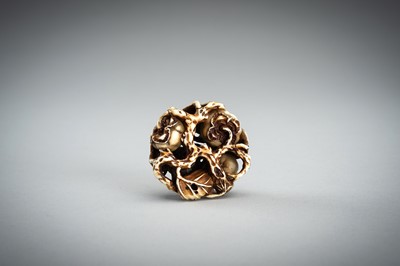 Lot 736 - AN IVORY MANJU NETSUKE WITH FROG ON LOTUS AND PERSIMMONS, 19th CENTURY