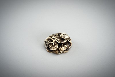 Lot 736 - AN IVORY MANJU NETSUKE WITH FROG ON LOTUS AND PERSIMMONS, 19th CENTURY