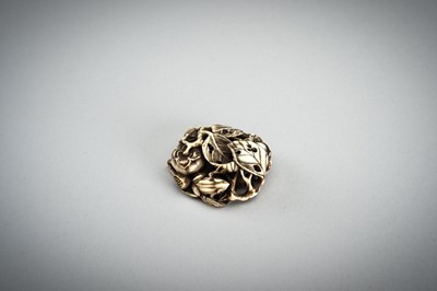 Lot 736 - AN IVORY MANJU NETSUKE WITH FROG ON LOTUS AND PERSIMMONS, 19th CENTURY