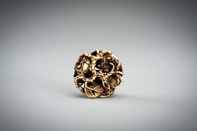 Lot 736 - AN IVORY MANJU NETSUKE WITH FROG ON LOTUS AND PERSIMMONS, 19th CENTURY