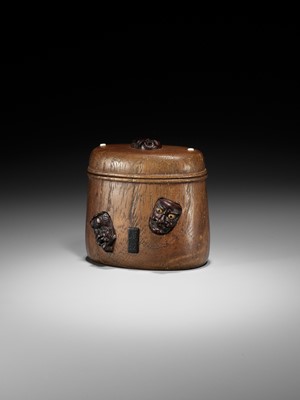 Lot 438 - MINKO: AN INLAID WOOD TONKOTSU WITH NOH AND KYOGEN MASKS