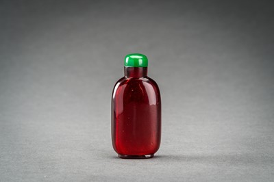 A TRANSPARENT RUBY RED GLASS SNUFF BOTTLE, QING DYNASTY