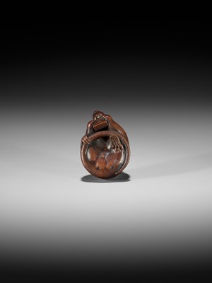 Lot 87 - KANO TOMOKAZU: A FINE WOOD NETSUKE OF A RAT BITING INTO A SHOGI PIECE