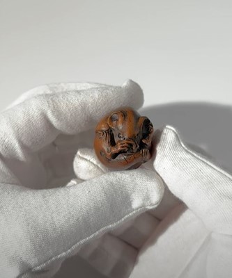 Lot 77 - ITTAN: A FINE WOOD NETSUKE OF A COILED RAT