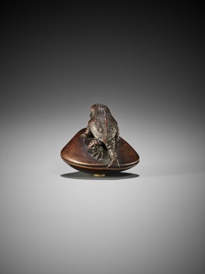 Lot 348 - SUKETADA: A FINE WOOD NETSUKE OF A KAPPA ON HAMAGURI CLAM