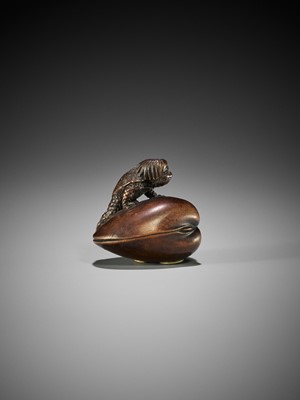 Lot 348 - SUKETADA: A FINE WOOD NETSUKE OF A KAPPA ON HAMAGURI CLAM