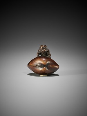 Lot 348 - SUKETADA: A FINE WOOD NETSUKE OF A KAPPA ON HAMAGURI CLAM