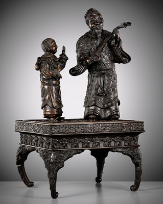 A LARGE AND FINE BRONZE OKIMONO DEPICTING A BOY WITH A MUSICIAN
