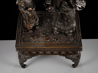 A LARGE AND FINE BRONZE OKIMONO DEPICTING A BOY WITH A MUSICIAN