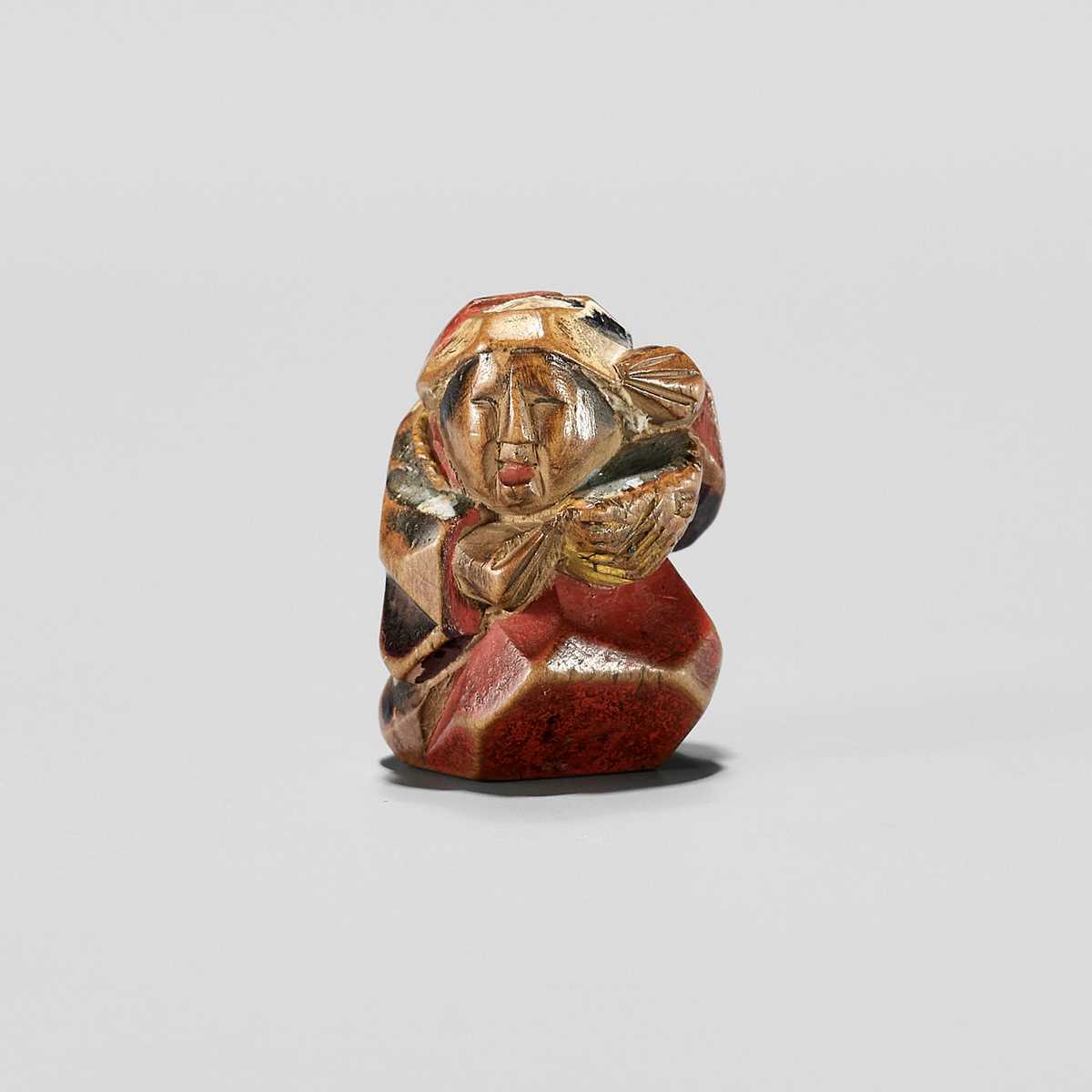 A CHARMING POLYCHROME WOOD ITTOBORI NETSUKE