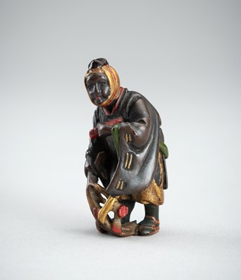 Lot 789 - A LACQUER NETSUKE OF A FARMER, MEIJI