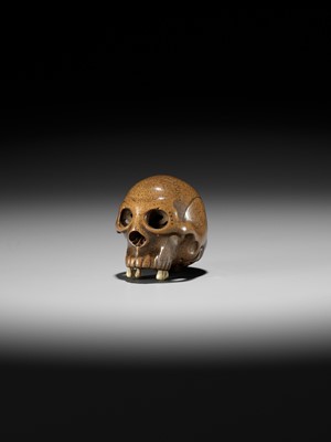 Lot 110 - TADASHIGE: A SUPERB WOOD NETSUKE OF A SKULL WITH INLAID STAG ANTLER TEETH