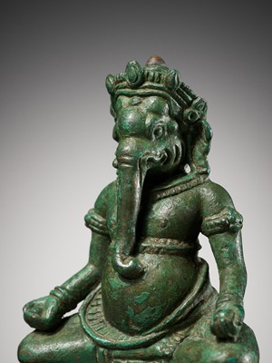 Lot 217 - A BRONZE FIGURE OF GANESHA, ANGKOR PERIOD, KHMER EMPIRE, 11TH-12TH CENTURY OR EARLIER