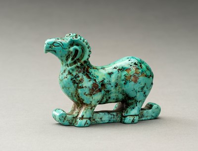 Lot 761 - A TURQUOISE CARVING OF A RAM