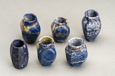 Lot 676 - A GROUP OF SIX GRECO-BACTRIAN MINIATURE LAPIS LAZULI VESSELS