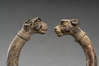 Lot 765 - AN ACHAEMENID SILVER LAMB-HEADED BRACELET