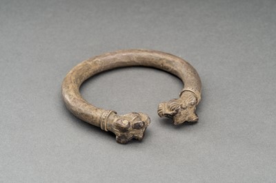 Lot 765 - AN ACHAEMENID SILVER LAMB-HEADED BRACELET