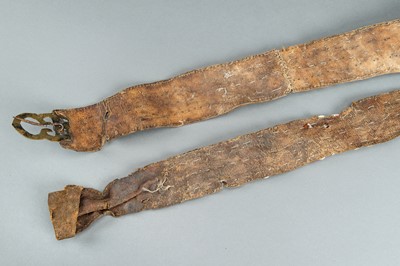 Lot 717 - LOT WITH TWO TRIBAL NAGALAND SHELL STUDDED BELTS AND AN APRON, c. 1900s
