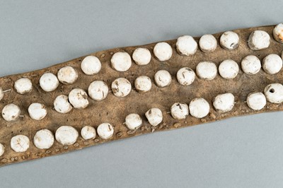 Lot 717 - LOT WITH TWO TRIBAL NAGALAND SHELL STUDDED BELTS AND AN APRON, c. 1900s