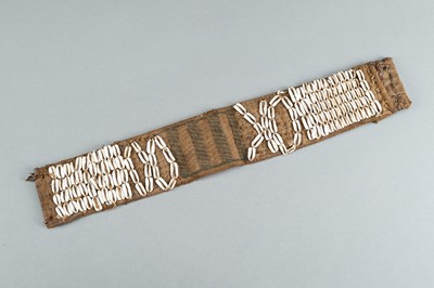 Lot 717 - LOT WITH TWO TRIBAL NAGALAND SHELL STUDDED BELTS AND AN APRON, c. 1900s