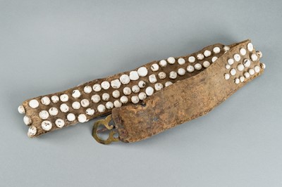 Lot 717 - LOT WITH TWO TRIBAL NAGALAND SHELL STUDDED BELTS AND AN APRON, c. 1900s