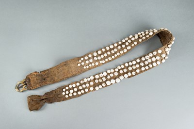 Lot 717 - LOT WITH TWO TRIBAL NAGALAND SHELL STUDDED BELTS AND AN APRON, c. 1900s