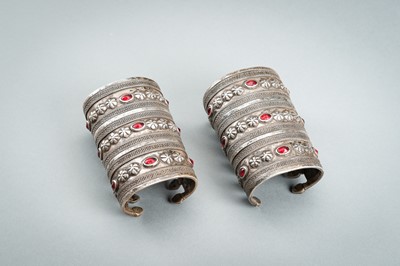 Lot 741 - A PAIR OF TURKOMAN GLASS INSET SILVER BRACELETS, c. 1900s