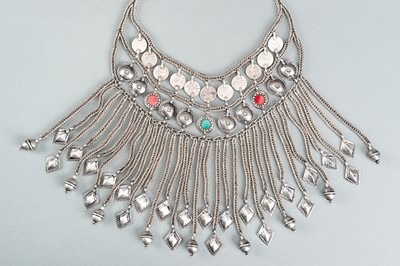 Lot 736 - A TRIBAL AFGHAN MULTI-STRAND SILVER NECKLACE WITH GLASS INSETS, c. 1950s