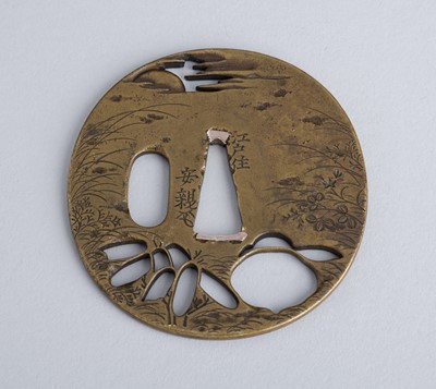 Lot 453 - YASUCHIKA: A BRASS TSUBA WITH AUTUMN PLANTS, EDO