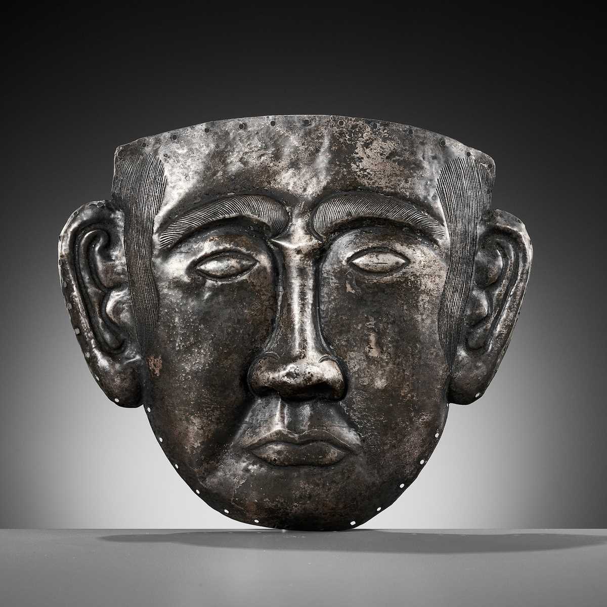 Lot 107 - A SILVER FUNERARY MASK OF A NOBLEMAN, LIAO DYNASTY