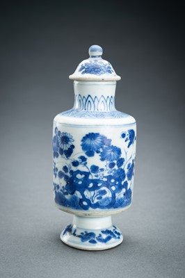 Lot 321 - TWO BLUE AND WHITE PORCELAIN VASES WITH COVERS, 17th CENTURY