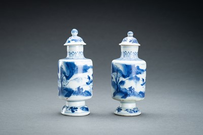 Lot 321 - TWO BLUE AND WHITE PORCELAIN VASES WITH COVERS, 17th CENTURY