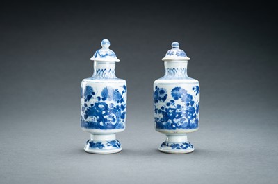 Lot 321 - TWO BLUE AND WHITE PORCELAIN VASES WITH COVERS, 17th CENTURY