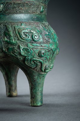 Lot 157 - AN ARCHAISTIC BRONZE RITUAL VESSEL, DING, QING DYNASTY